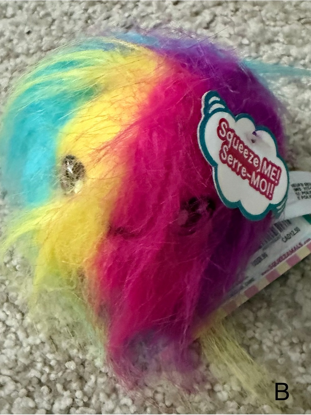 Squeezamals Fluffy Furball Series 2 Squishy Stuffed Animal rainbow